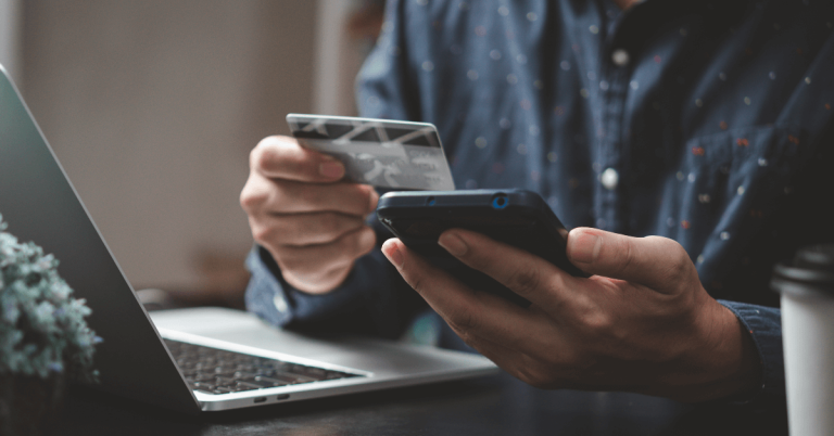 Man making card payment on his phone.